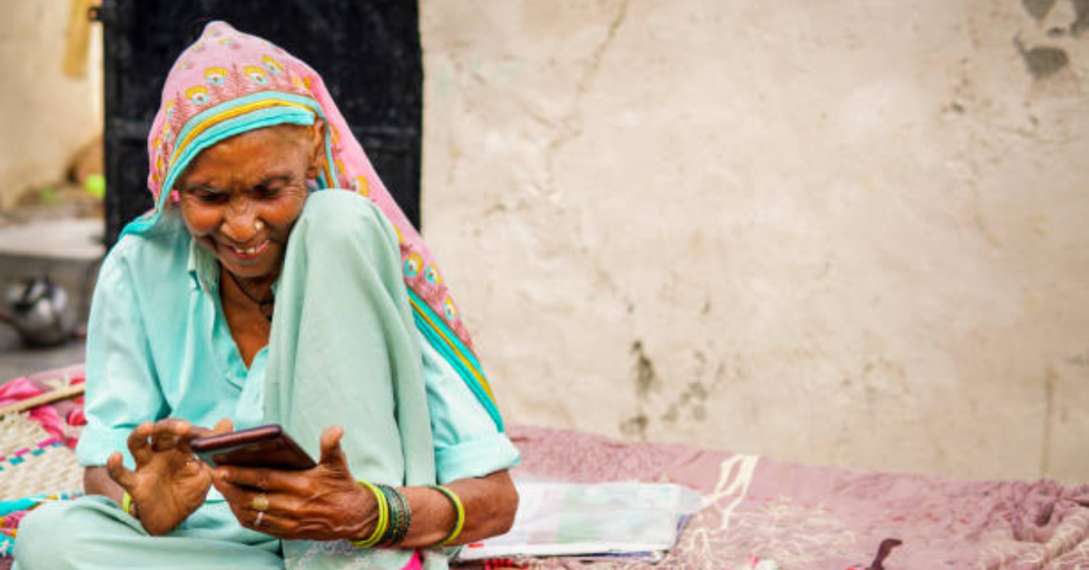 Devotee accessing temple rituals digitally through an online puja service.