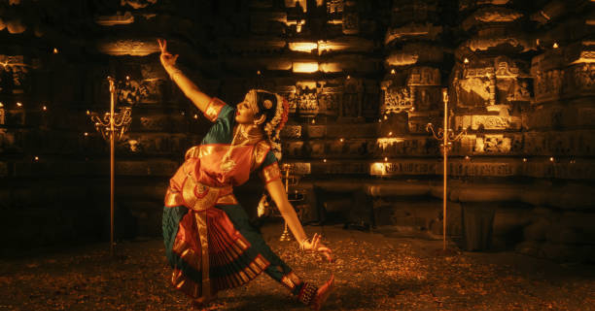 Bharatanatyam dancer performing in a Hindu temple while being digitally recorded for online streaming: Temples in the digital age
