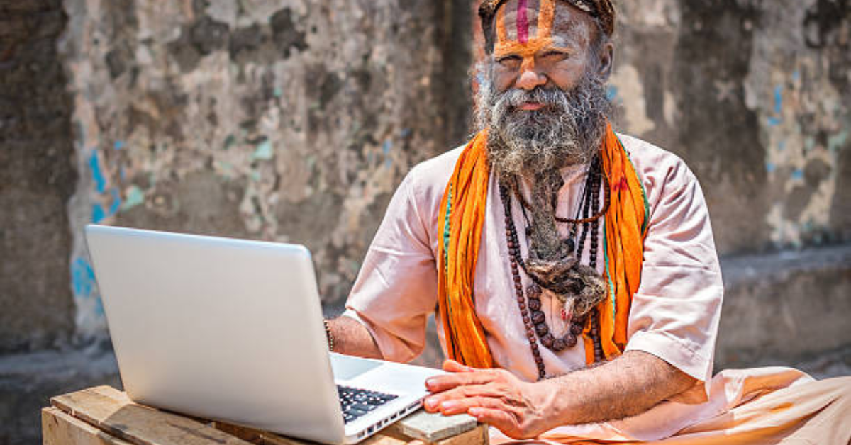Hindu priest conducting a live-streamed puja for devotees accessing temples digitally.
