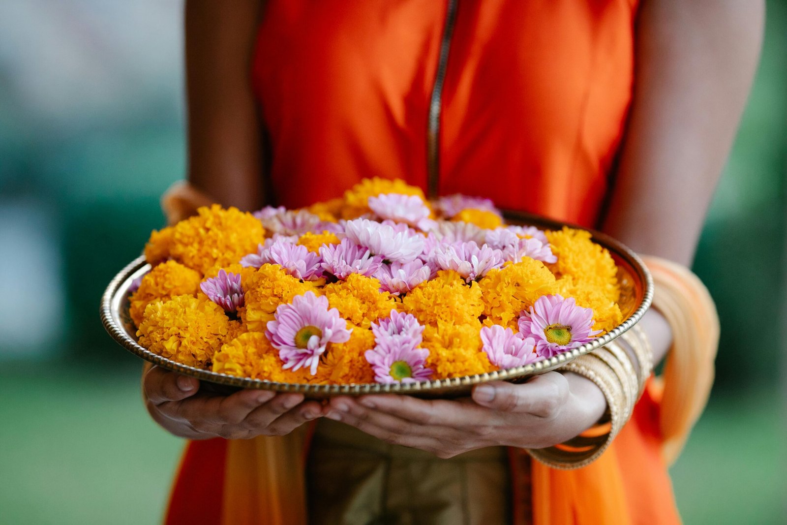 Devotees offering prasad and flowers on Guru Purnima